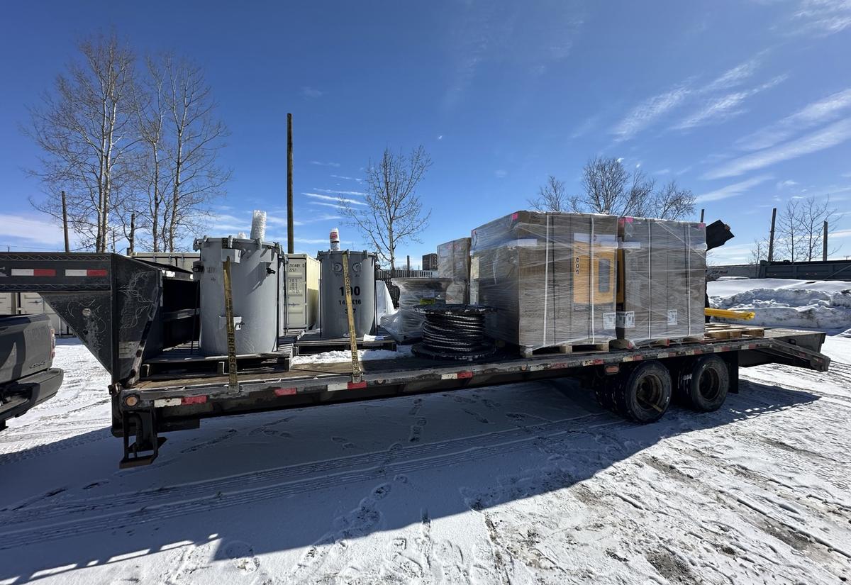 A flatbed loaded and strapped for the run out of Thunder Bay