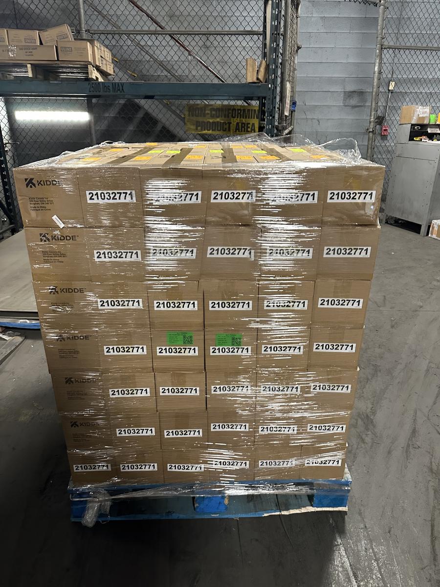 A wrapped pallet labelled and ready to leave for a community